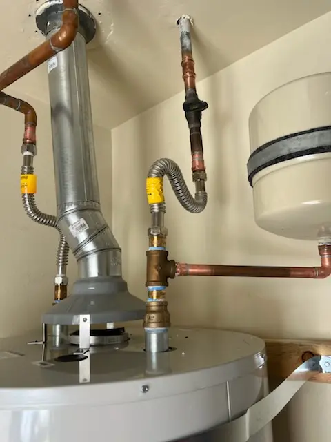Water heater installation and plumbing repair in Martins Addition